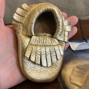 Gold LEATHER moccasins size 2